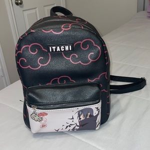 A faux leather mini backpack! Features an Akatsuki cloud and itachi.